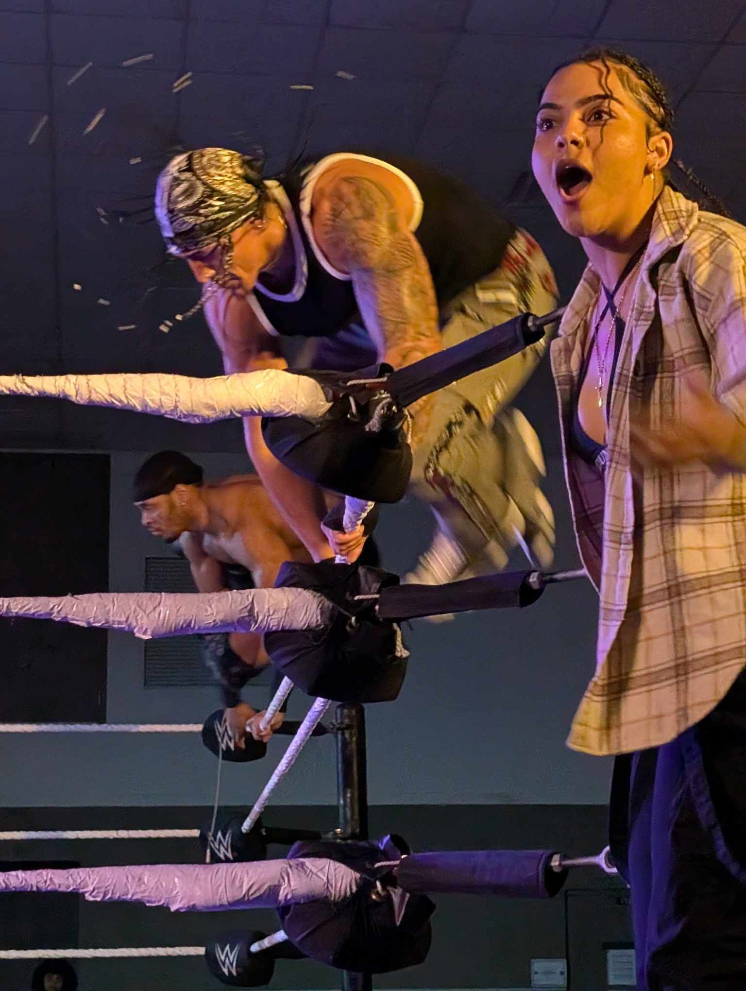 OTM wrestlers in a wrestling ring